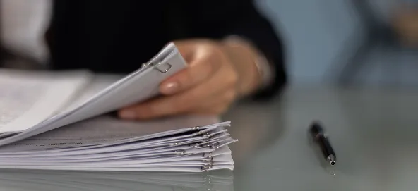 stack of complex paperwork